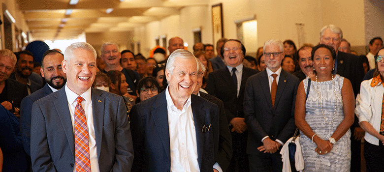 Carlos Alverez laughing at UT San Antonio Event