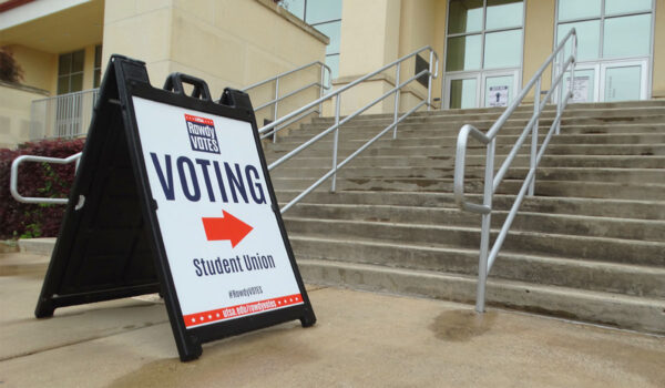 A sign pointing voters to a polling place inside the Student Union