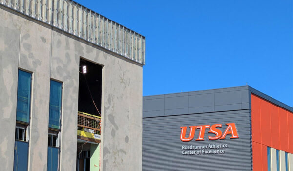The frame of a building next to the Roadrunner Athletics Center of Excellence