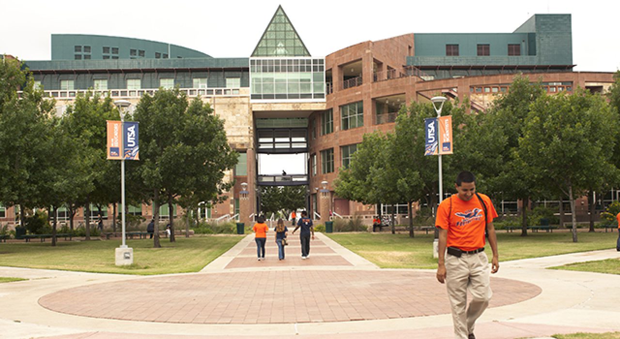 Students walking into building at downtown campus.