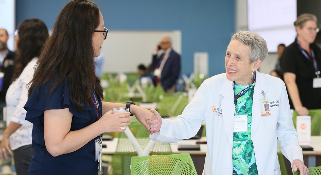 Professors Swati Banerjee and Susan Weintraub talking at the Health Research Challenge kickoff event.