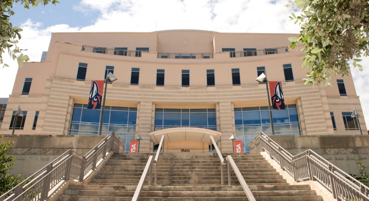 An upward shot of the Main Building from the stairs