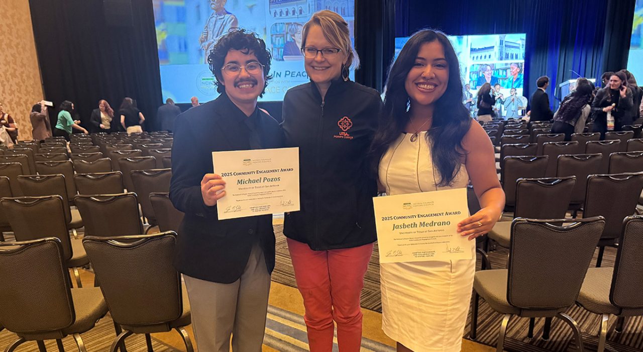 Students Jasbeth Medrano and Michael Pozos with Jill Fleuriet, vice provost for honors education, received the 2025 Community Engagement Award.