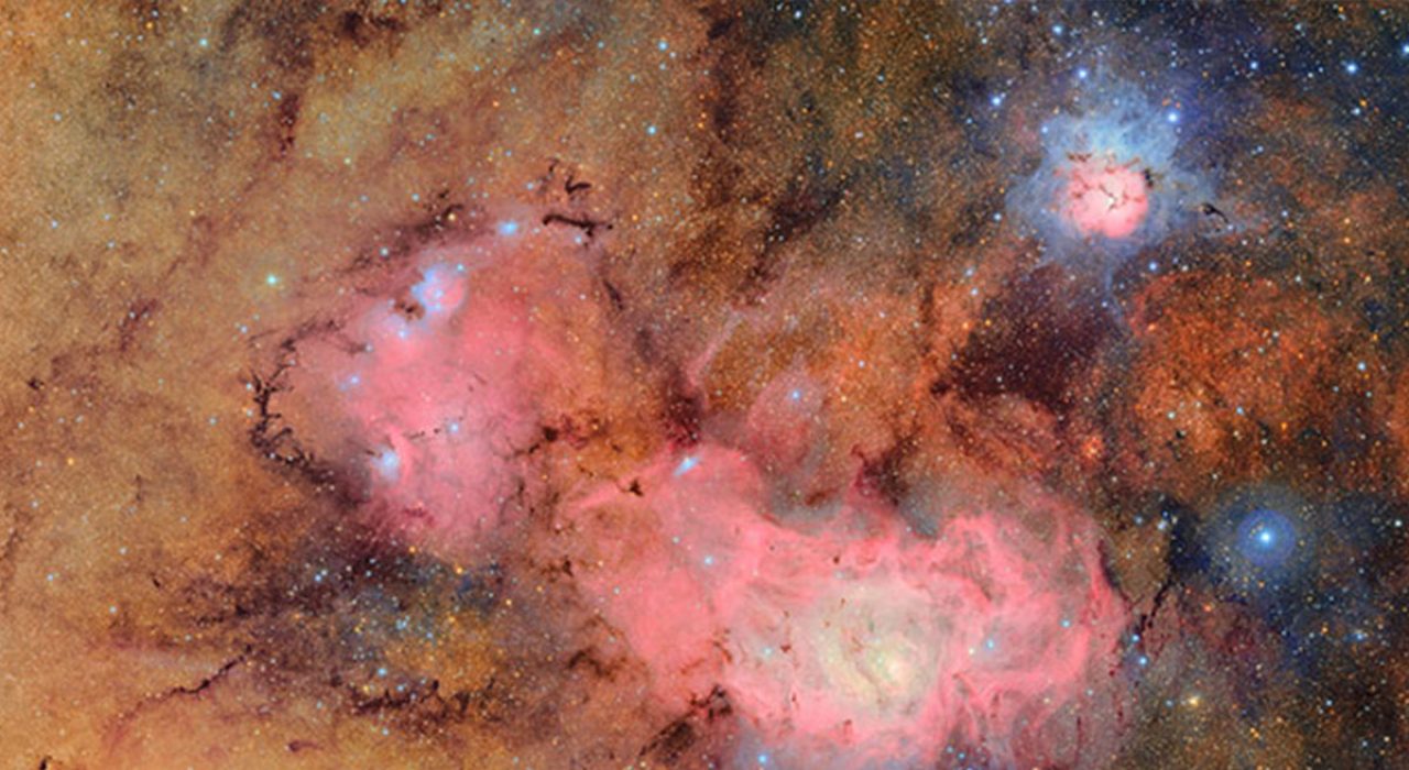 This image combines 678 separate images taken by NSF–DOE Vera C. Rubin Observatory in just over seven hours of observing time. Combining many images in this way clearly reveals otherwise faint or invisible details, such as the clouds of gas and dust that comprise the Trifid nebula (top) and the Lagoon nebula, which are several thousand light-years away from Earth. Photo Courtesy of NSF–DOE Vera C. Rubin Observatory.