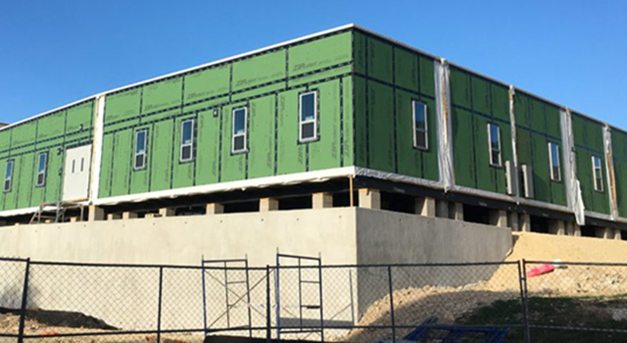 An architectural rendering of the Student Success Center advising complex.