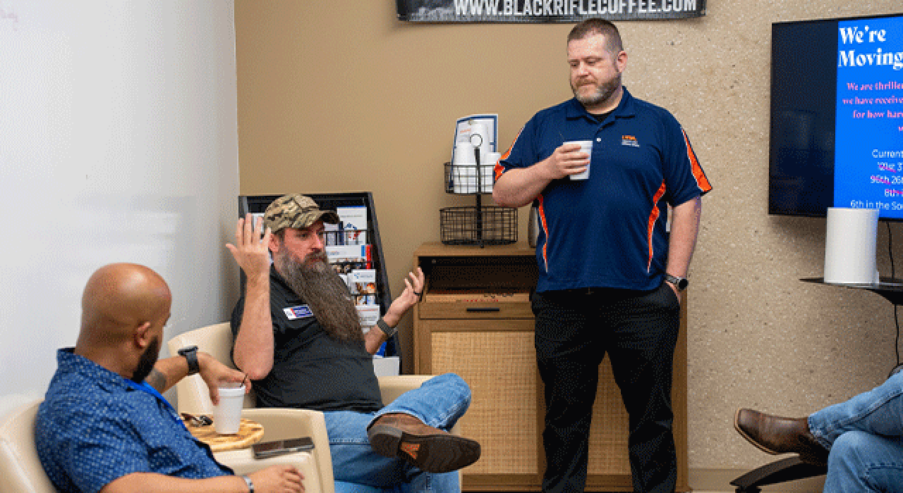 Michael Logan and Will Lansdon speak during a Coffee with Vets event on campus.