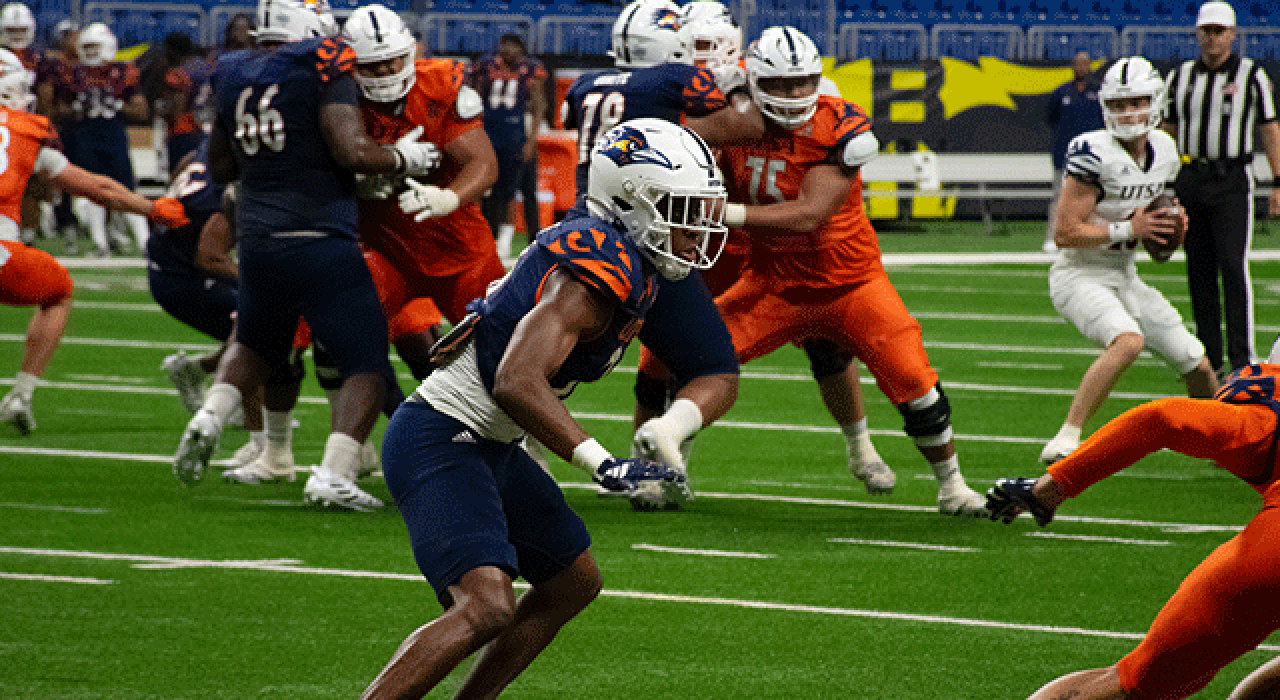 UTSA Football player Davin Martin signs autographs for fans after the UTSA Football Fiesta Spring Game.