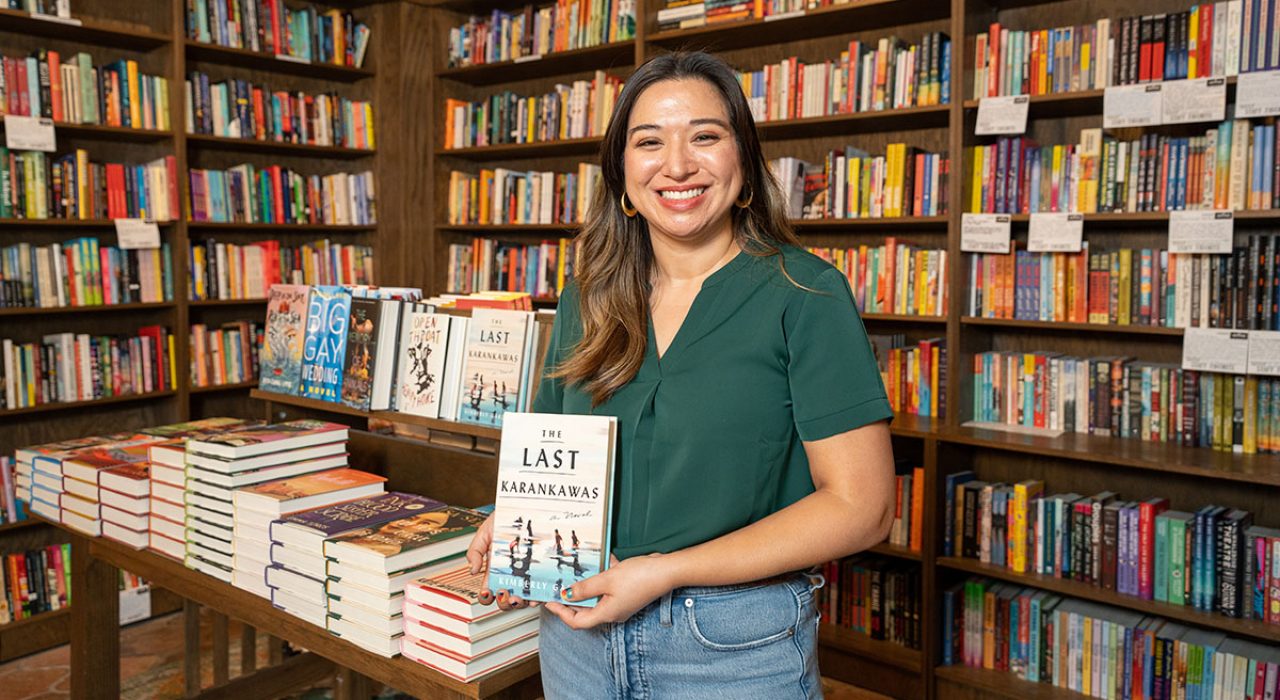 kimberly-garza-last-karakawas Kimberly Garza holds a copy of “The Last Karankawas” in a bookstore