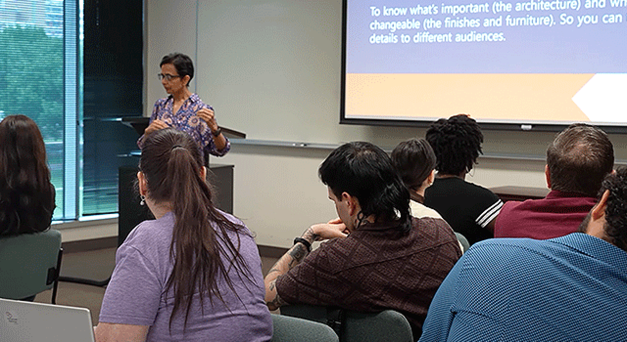 Purnima Chawla talks to a classroom of entrepreneurs and UTSA business students during a SURE program workshop.
