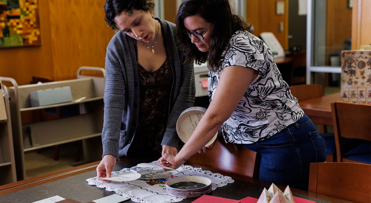 Student worker Annah Sanchez and Archivist Moira MacKay