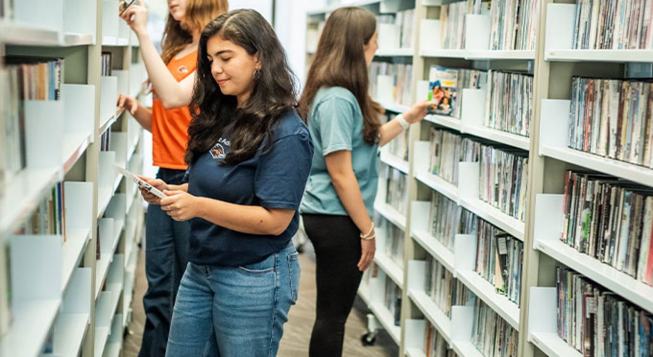 Students explore the library’s video offerings.